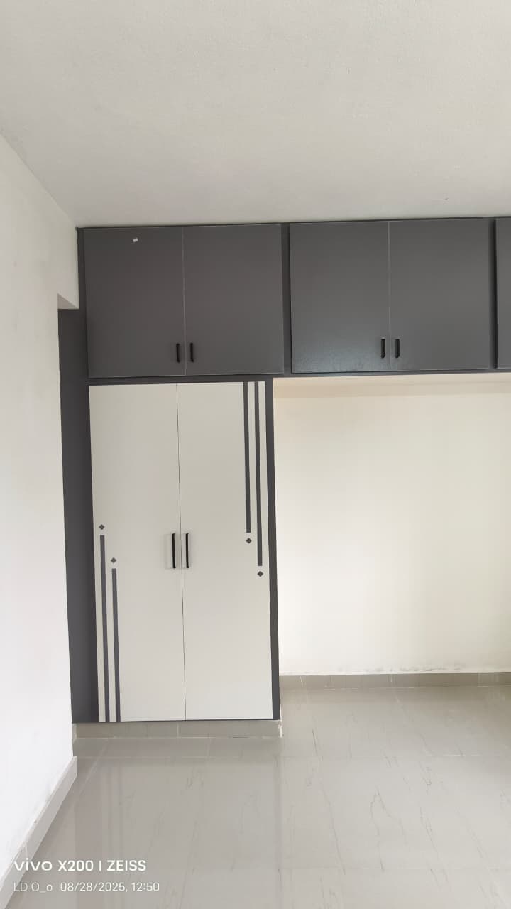 Custom UPVC wardrobe with white and grey geometric stripe detailing